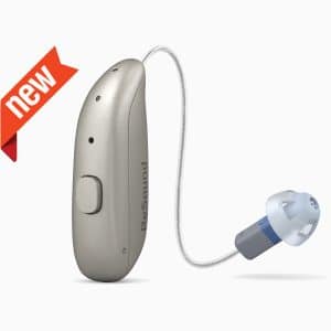 ReSound OMNIA rechargeable hearing aid with modern behind-the-ear design in beige color, placed on charging case.